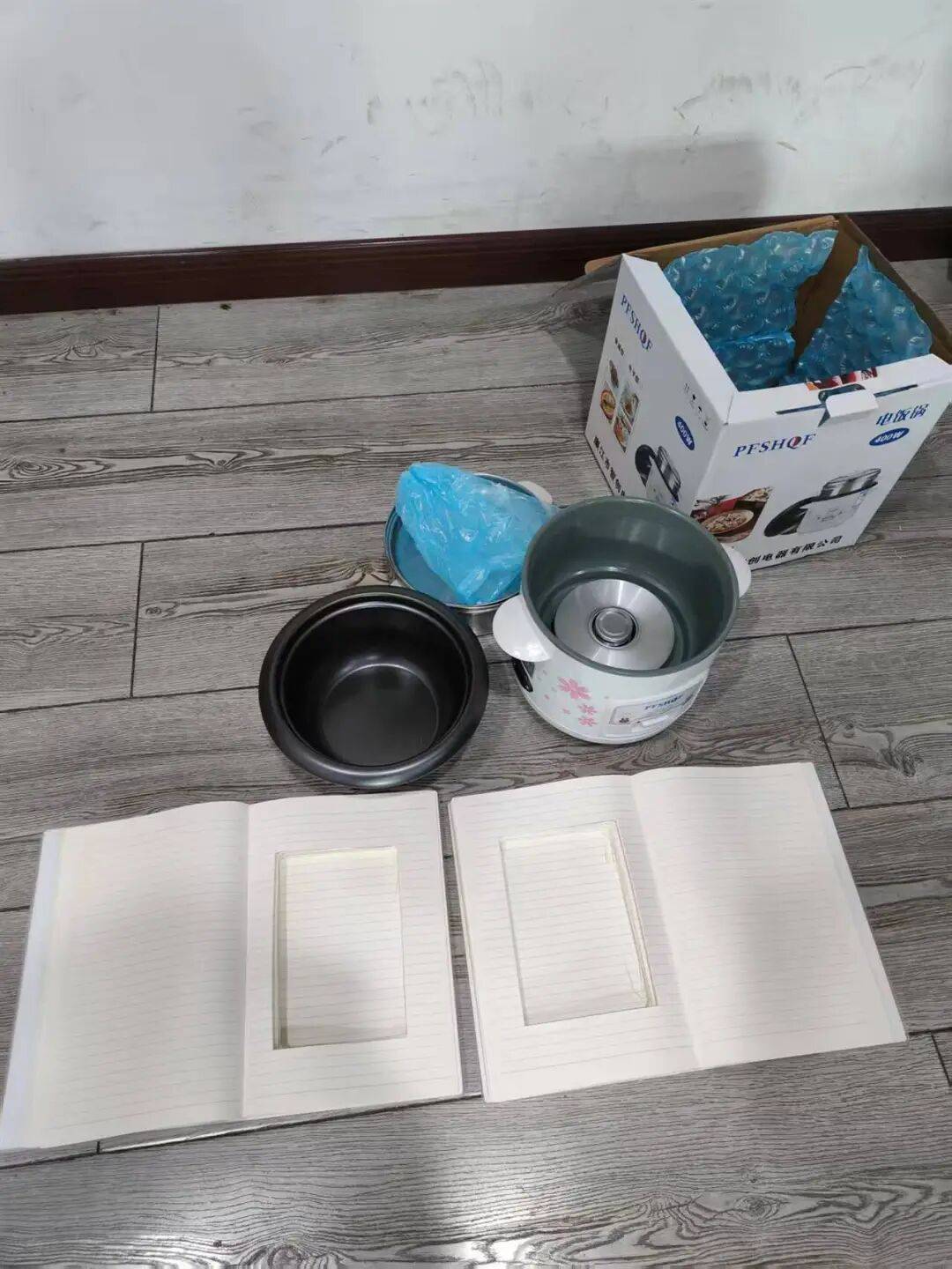 电饭煲内藏金条、书本里塞进4万元人民币！警方紧急截停一辆电动车